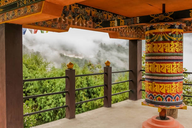 Buddhist prayer wheel in a temple in Bumthang, Bhutan stock photo