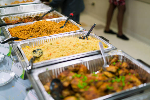 Buffet of Nigerian Food at newborn dedication stock photo