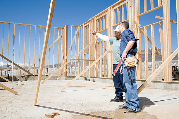 Builders on construction site stock photo