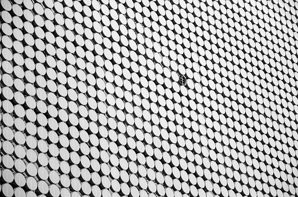 Building facade with a tile missing stock photo