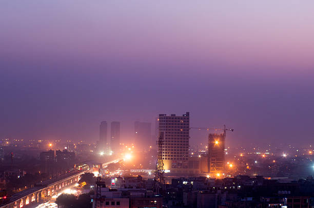 Buildings at dusk in Noida India noida stock pictures, royalty-free photos & images