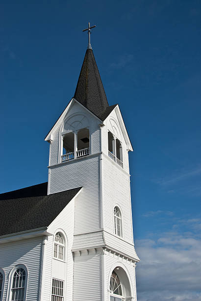 Steeple on the Historic Fir Conway Lutheran Church Built in 1916, Fir Conway Lutheran Church is one of the most beautiful churches in the Pacific Northwest. Inside the church, there's a lovely sanctuary and one of the finest pipe organs in the area. Fir Conway church is located in Conway, Washington State, USA. jeff goulden church stock pictures, royalty-free photos & images