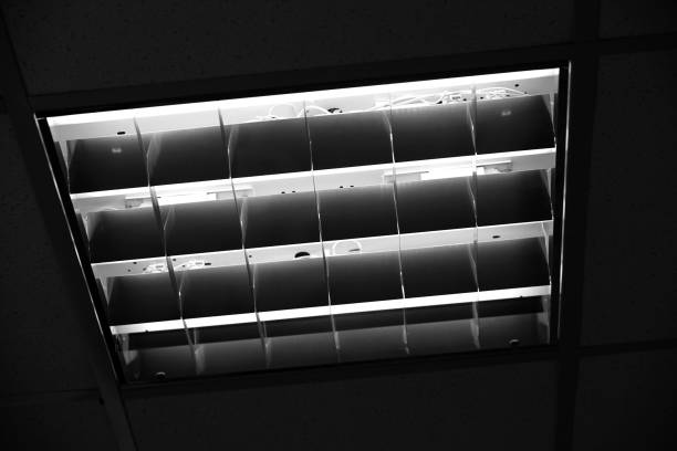 Built-in office ceiling light, close up black and white photo