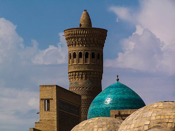 Bukhara Minaret The Kalyan Minaret, also known as the Tower of Death, rises above the Po-i-Kalyan mosque complex in the ancient Silk Road city of Bukhara, Uzbekistan. bukhara stock pictures, royalty-free photos & images
