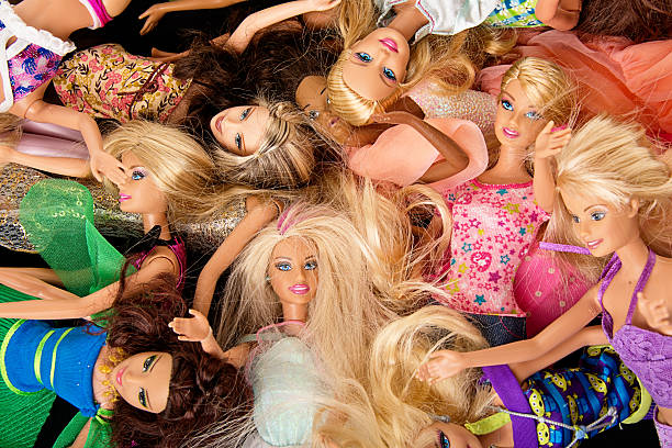 bunch of barbie fashon dolls - barbie stockfoto's en -beelden