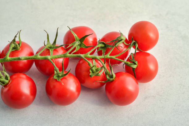 Bunch of cherry tomatoes stock photo