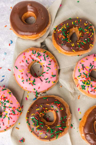 A bunch of donuts on a napkin stock photo