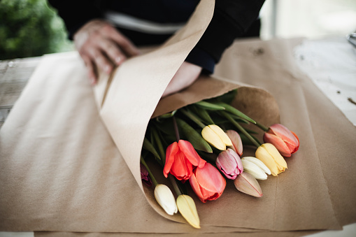 Bunch Of Rainbow Tulips In Brown Paper Wrap Stock Photo - Download ...