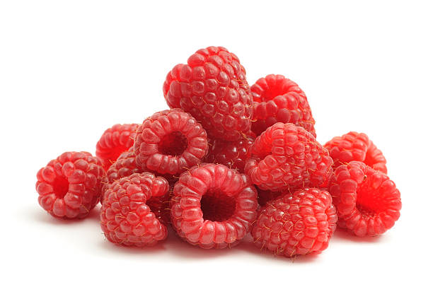 Bunch of raspberries on white background stock photo