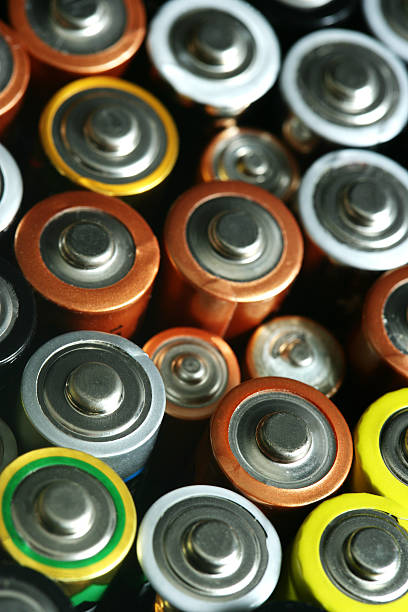A bunch of triple and double a batteries stock photo