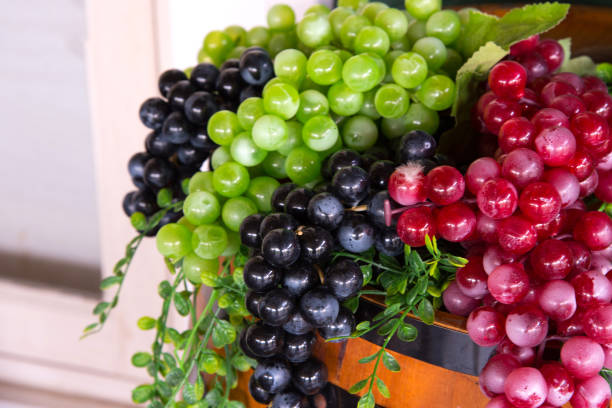 Bunches of fresh ripe red,green and black grapes stock photo