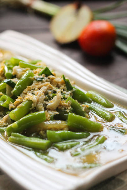 Buncis Telur or Stir Fry Green Bean with Egg.  buncis telur stock pictures, royalty-free photos & images