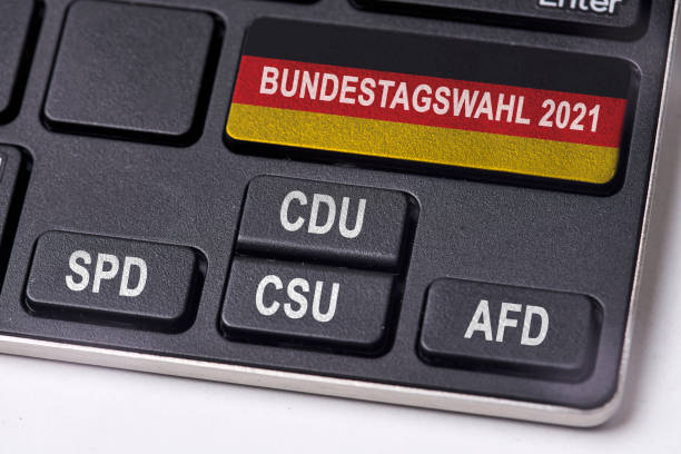 Bundestagswahl 2021. Germany Parliament Bundestag elections concept on keyboard Bundestagswahl 2021. Germany Parliament Bundestag elections concept on keyboard with most popular political parties - CDU, SPD, CSU and AFD alternative for germany stock pictures, royalty-free photos & images