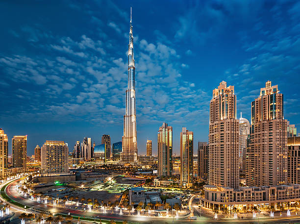 Burj Khalifa With Dubai Downtown Towers at Sunset Dubai, UAE, December 31, 2013 Dubai  stock pictures, royalty-free photos & images