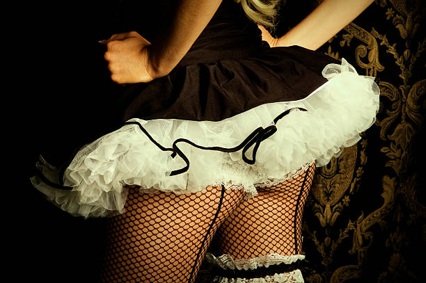 Burlesque Dancer  french maid outfit stock pictures, royalty-free photos & images