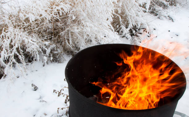 burning barrel stock photo