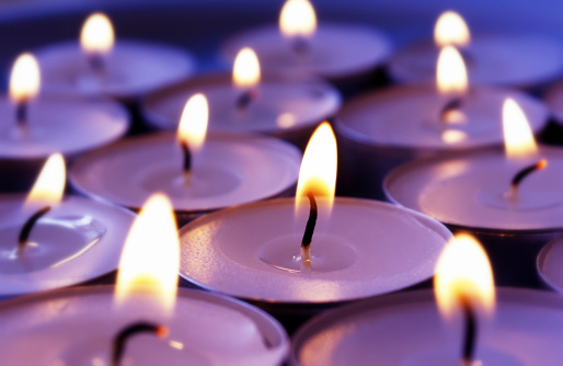 Atmospheric violett candles background