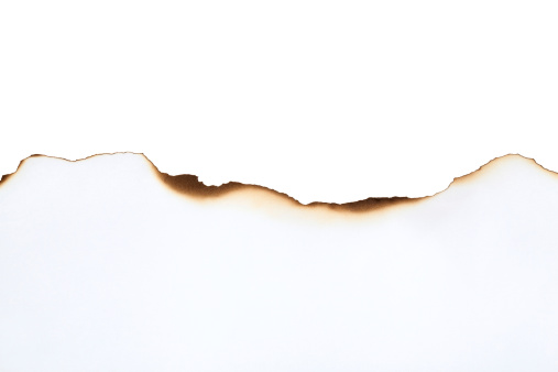 Close-up of blank burnt paper edge.