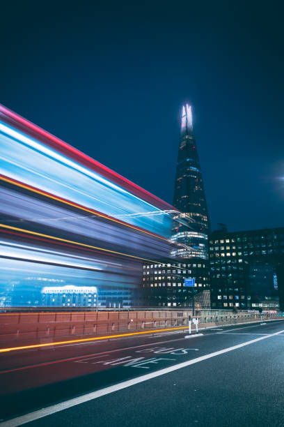 Bus In motion near The Shard in Central London stock photo