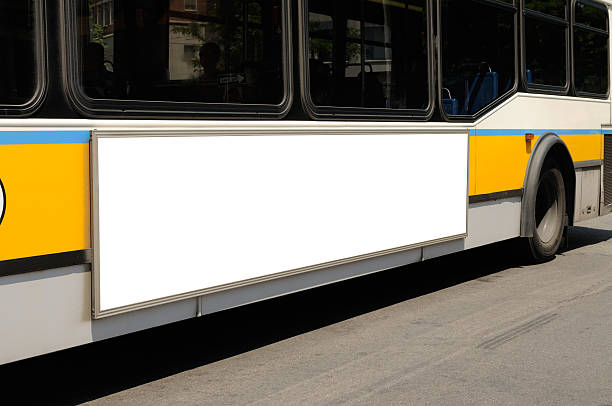 Bus on the road with a blank billboard Blank billboard on bus side. Outdoor advertisement close-up. bus stock pictures, royalty-free photos & images