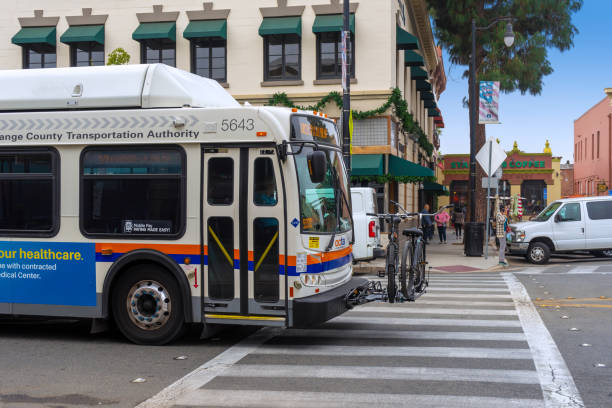 OCTA bus with bicycle rack in the City of Orange, California stock photo