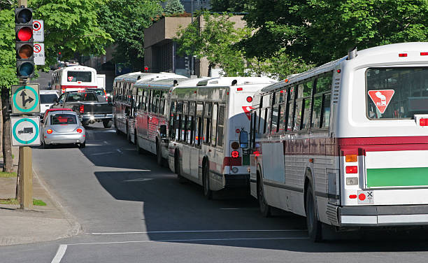 Buses stuck in city street traffic  buzbuzzer quebec city stock pictures, royalty-free photos & images