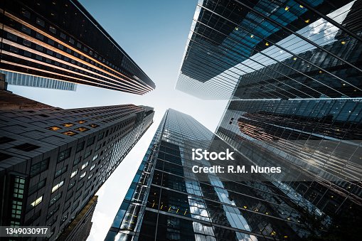 istock Business and Finance, Looking Up at High Rise Office Buildings in the Financial District of a Modern Metropolis 1349030917