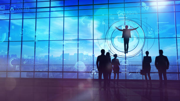Business Angel in front of large windows stock photo