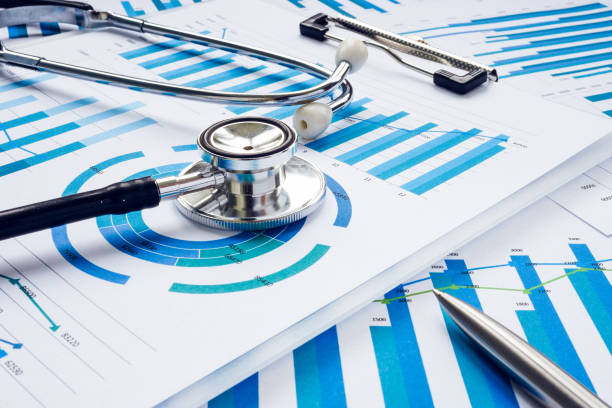Business audit and analysis concept. Stethoscope on the financial charts. stock photo