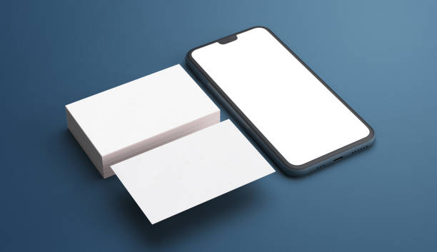 Business cards and phone for branding mockup. Stationery and brand presentation concept stock photo