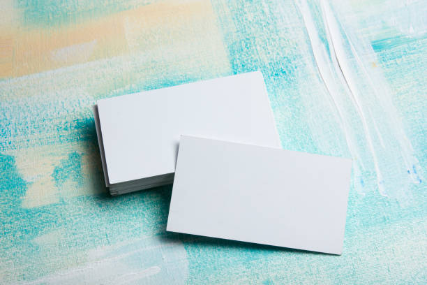 Business cards blank. Mockup on color background. Flat Lay. copy space for text stock photo