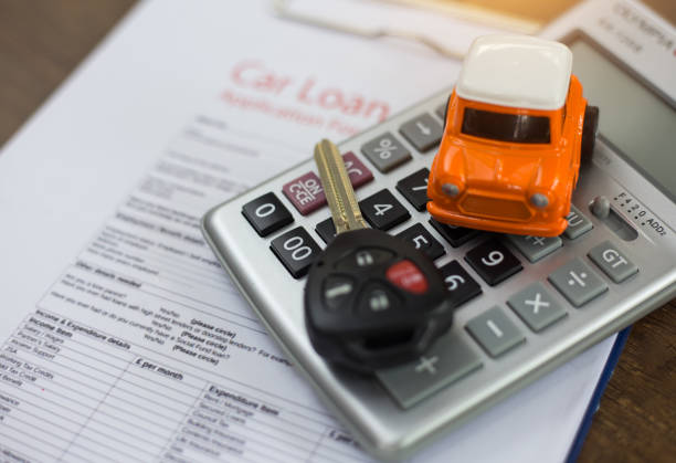 Business concept, car insurance, sell and buy car, car financing, car key for Vehicle Sales Agreement. stock photo