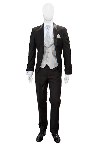 Business dark grey suite Business dark grey suite on mannequin isolated on white bodice stock pictures, royalty-free photos & images