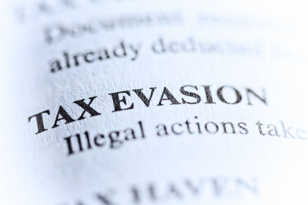 Business dictionary definition of "Tax Evasion" stock photo