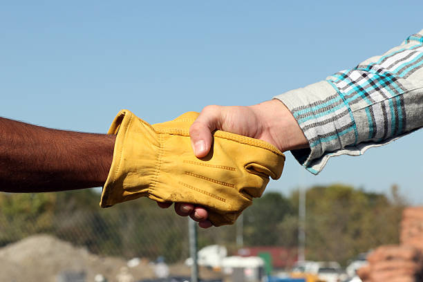 business handshake - handschuh stock-fotos und bilder