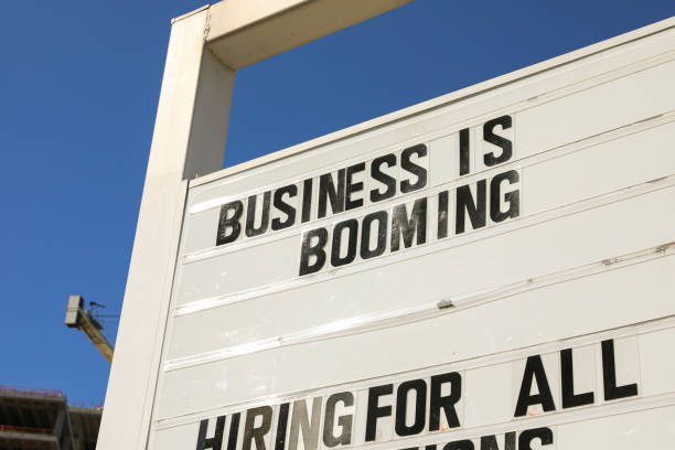 Business is booming exterior sign stock photo