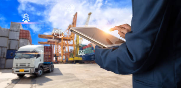 Business Logistics concept, Businessman manager using tablet check and control for workers with Modern Trade warehouse logistics. Industry 4.0 concept stock photo