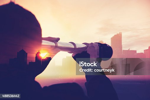 istock Business man in suit with cityscape montage. 488536442