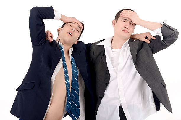 Business men fired, upset. Out of job due to crisis. stock photo