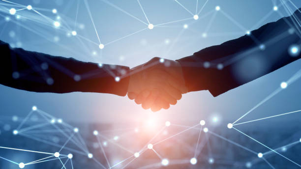 Business network concept. Teamwork. Partner ship. Shaking hands. stock photo