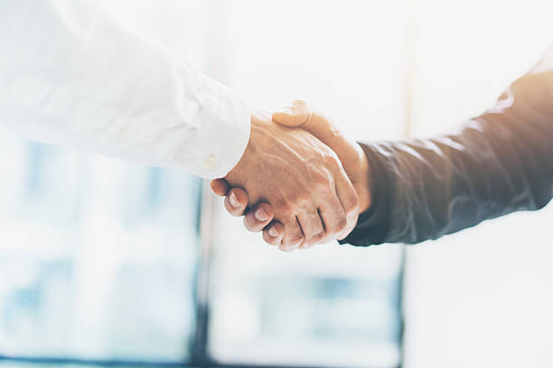 Business partnership meeting. Picture businessmans handshake. Successful businessmen handshaking after Business partnership meeting. Picture businessmans handshake. Successful businessmen handshaking after good deal. Horizontal, blurred business handshake stock pictures, royalty-free photos & images