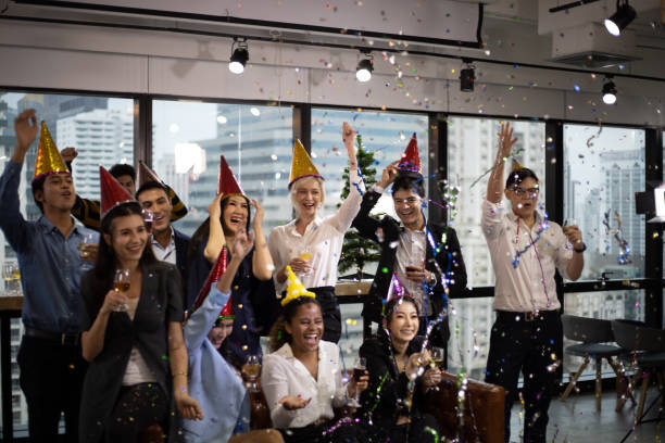 Business persons group happy new year party in the offices. stock photo