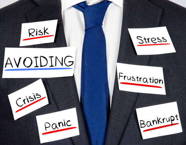 Business suit Photo of business suit and tie with AVOIDING concept paper cards avoiding debt stock pictures, royalty-free photos & images