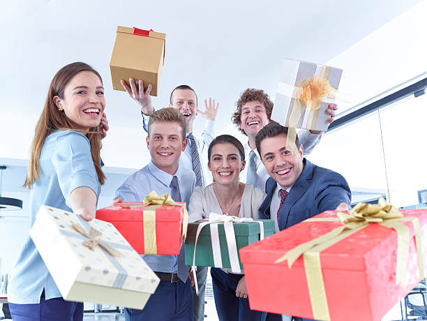 Business Team With Gift Boxes stock photo