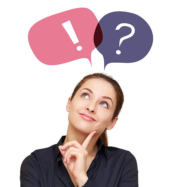 Business woman with colorful question mark and exclamation in balloons stock photo