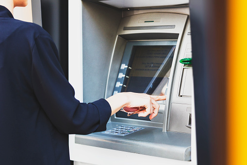 Business Woman Withdrawing Money From Atm Stock Photo - Download Image