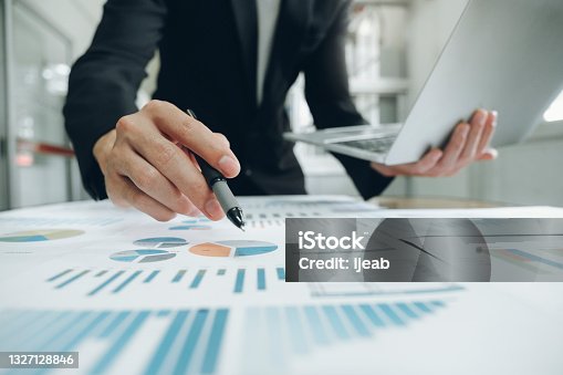 istock Businessman analyse investment marketing data. 1327128846