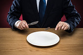 ビジネスマンと食事のイメージ