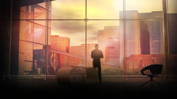 Businessman at the office window overlooking the city buildings, 3D render. stock photo