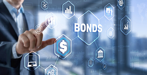 Businessman clicks inscription bonds. Bond Finance Banking Technology concept.